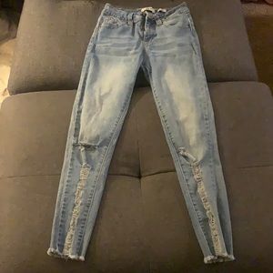 Blue ripped skinny jeans